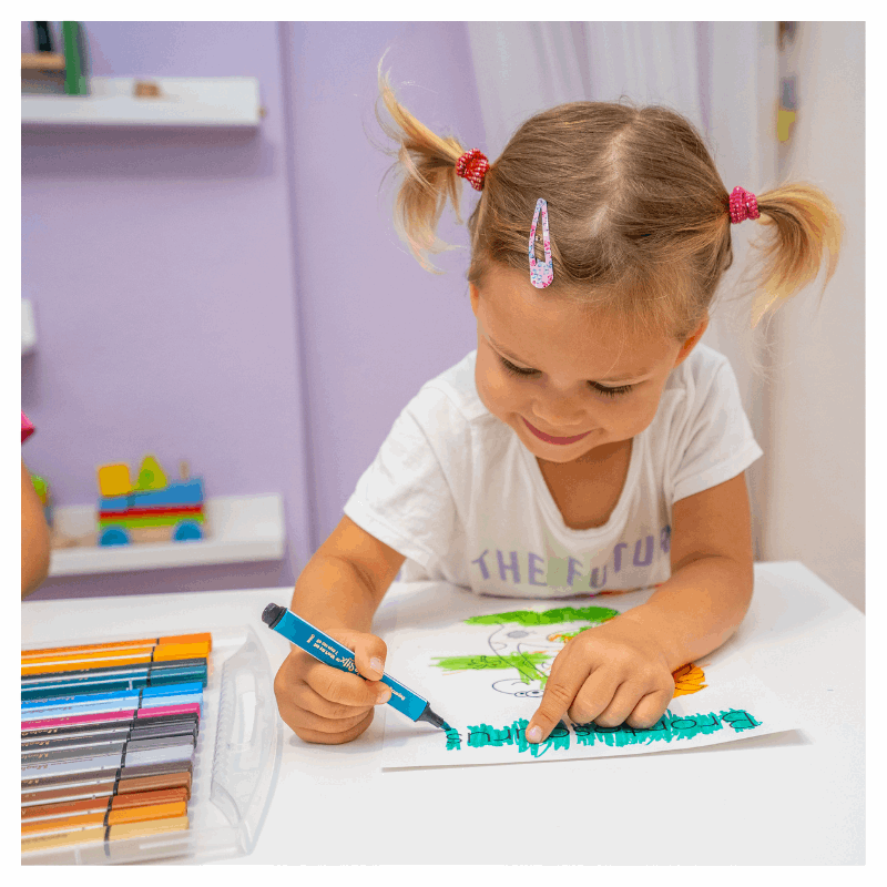 girl drawing with magic stix markers