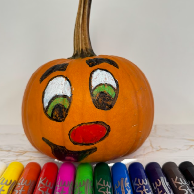 pumpkin painting with kwik stix on table